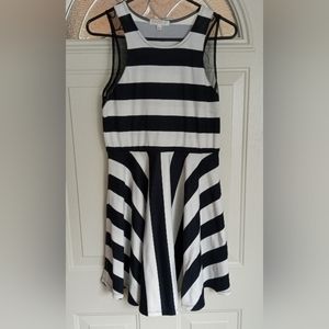 Black and white sleeveless dress. Size L.  But runs very small.